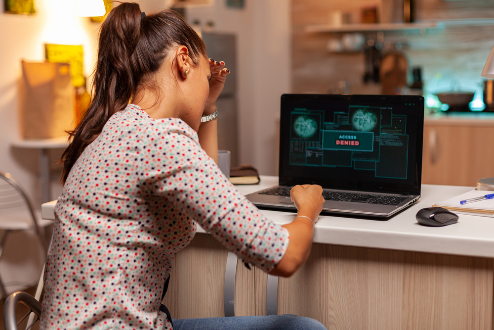 Angry hacker woman